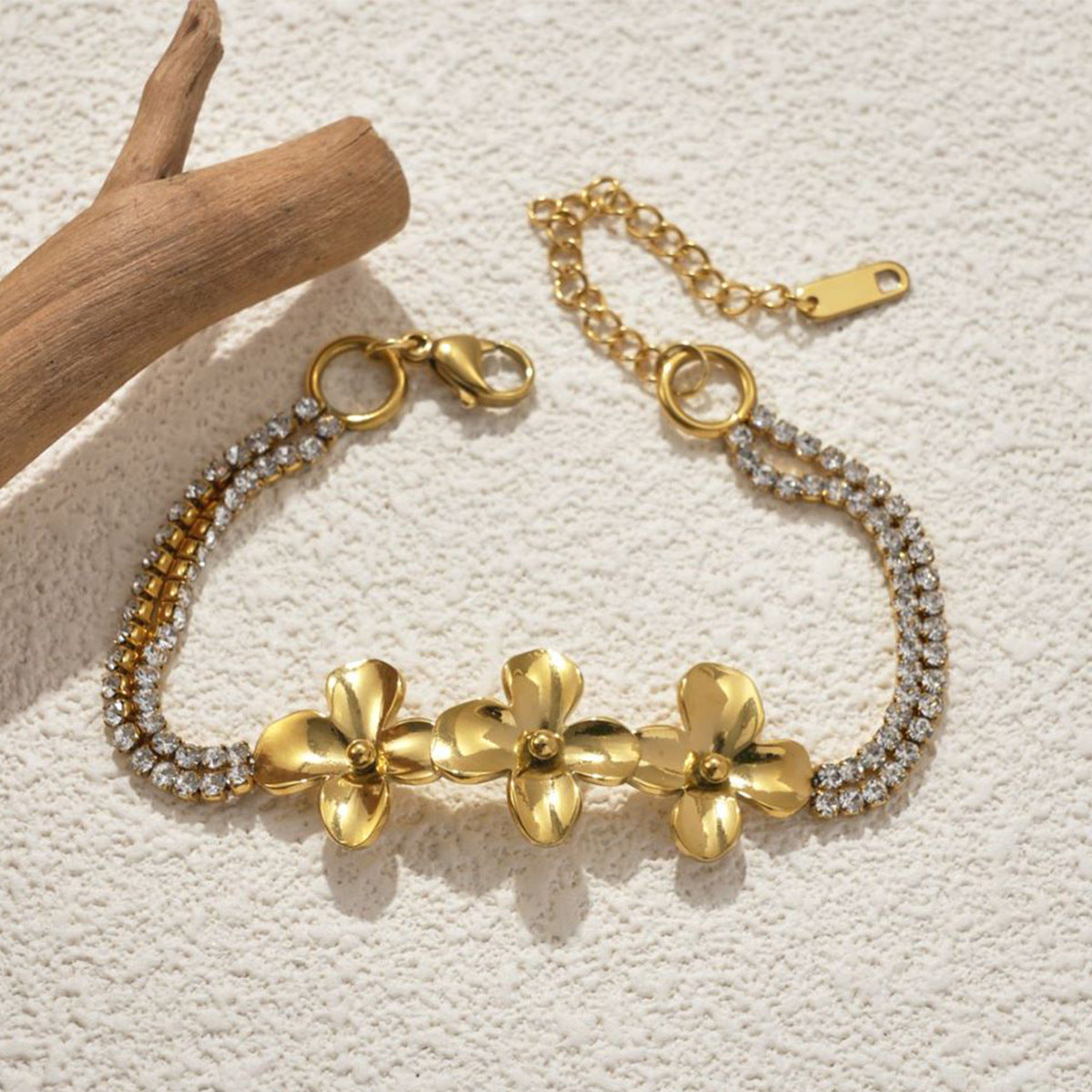 Gold flower charm bracelet with rhinestone chain